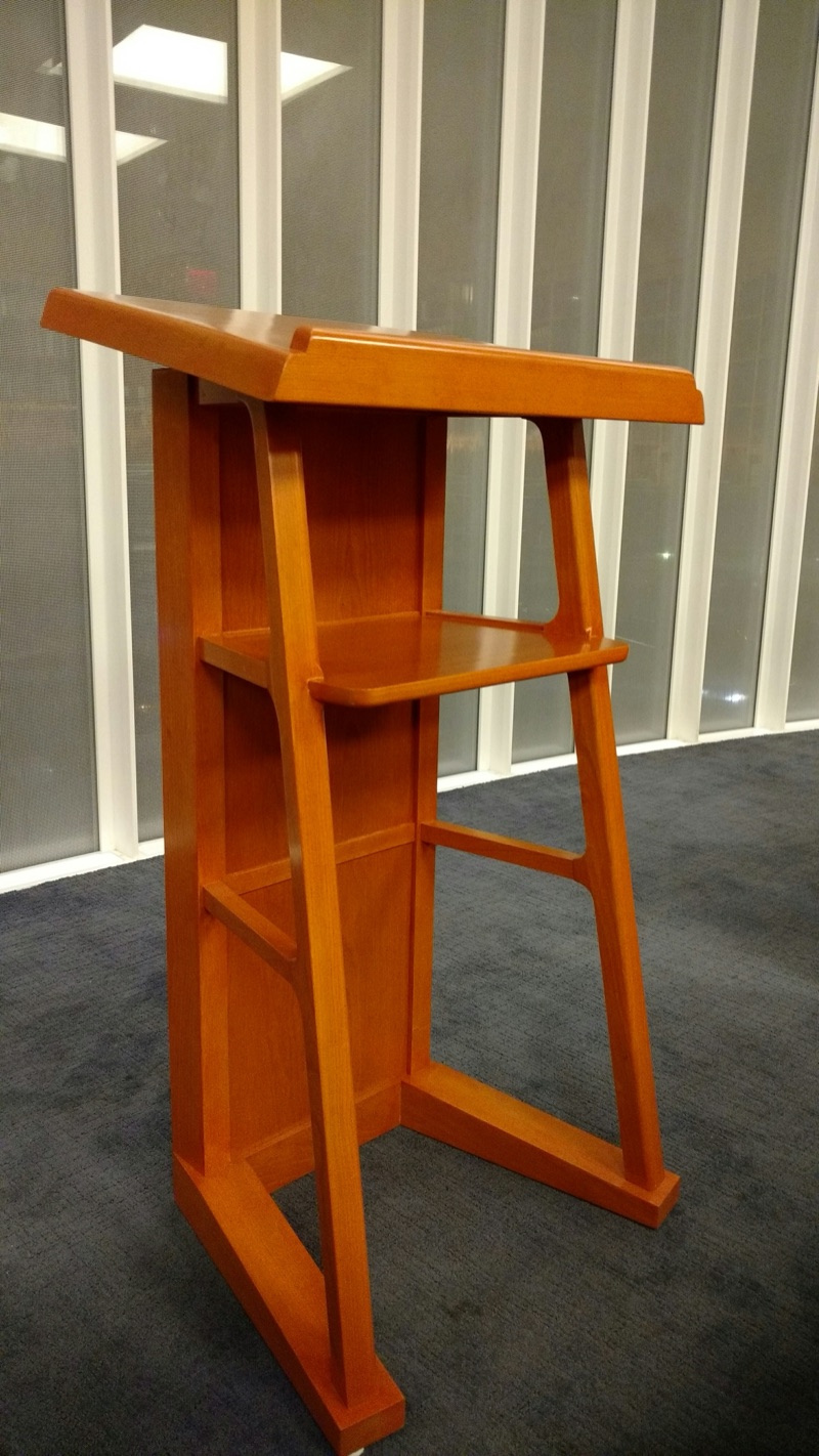Detail of a custom synagogue lectern with a slatted side and angled reading surface by Van Aken Design